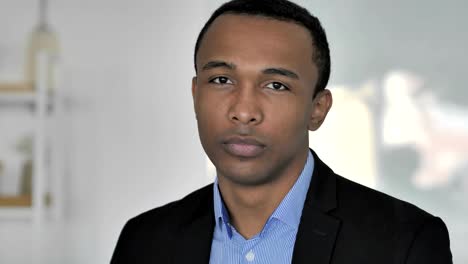 Portrait-of-Smiling-Casual-Afro-American-Businessman-Looking-at-Camera