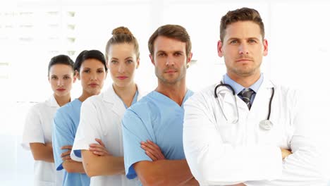 Frowning-medical-team-with-arms-crossed