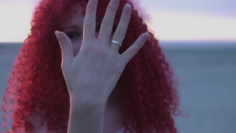 4k-Shot-of-a-Redhead-Bride-on-the-Beach