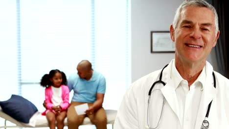 Portrait-of-smiling-male-doctor