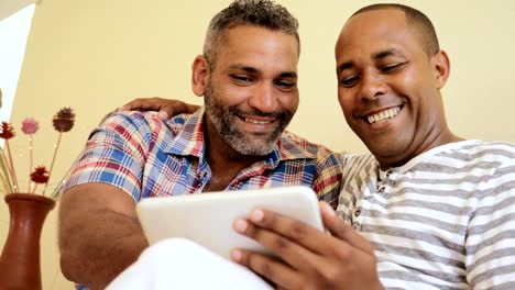 Happy-Gay-Couple-Homosexual-People-Men-Kissing-And-Using-Computer