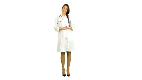 Beautiful-young-female-doctor-in-lab-coat-with-stethoscope-looking-into-the-camera-on-white-background