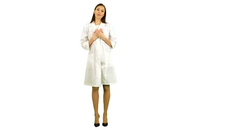 Smiling-beautiful-woman-in-lab-coat-talking-to-the-camera-on-white-background