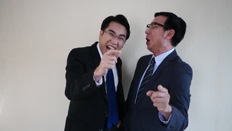 Two-businessman-laughing.