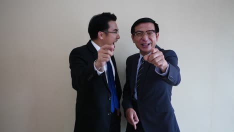 Two-businessman-laughing.