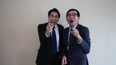 Two-businessman-laughing.