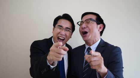 Two-businessman-laughing.