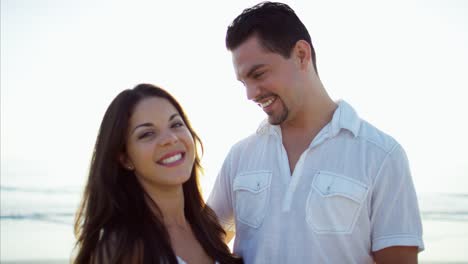 Portrait-of-Hispanic-male-and-female-on-beach