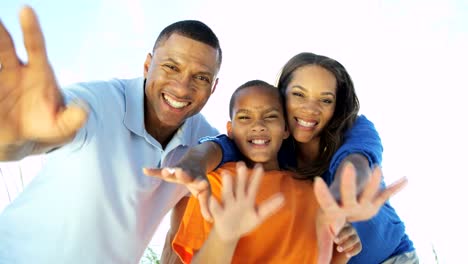 Portrait-of-African-American-family-making-video-diary