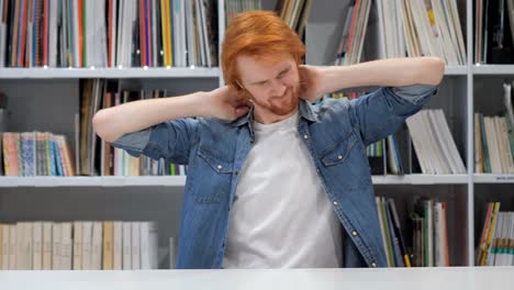 Tired-Redhead-Man-Trying-to-Relax-Body-by-Stretching