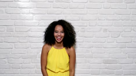 Facial-Expressions-Of-Young-Black-Woman-On-Brick-Wall