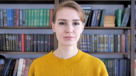 Portrait-of-Serious-Young-Woman-Looking-at-Camera