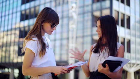 Business-colleagues-successful-meeting-and-working-together-on-an-idea-on-paper-near-business-office.-businesswoman-people-discussing-the-latest-news-in-the-world-markets