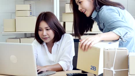 Asian-woman-working-together-at-home.-Woman-startup-for-business-together.-People-working-with-SME,-Online-Business,-Startup-business-concept.