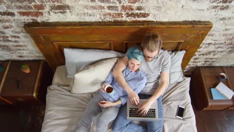 Man-Spending-Time-with-Girlfriend-while-Working-from-Home