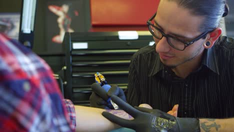 Close-Up-Of-Woman-Having-Tattoo-In-Parlor-Shot-On-R3D