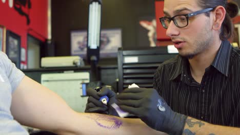 Close-Up-Of-Man-Having-Tattoo-In-Parlor-Shot-On-R3D