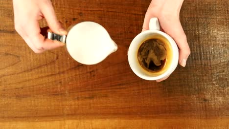 How-to-make-latte-art-by-barista-focus-in-milk-and-coffee