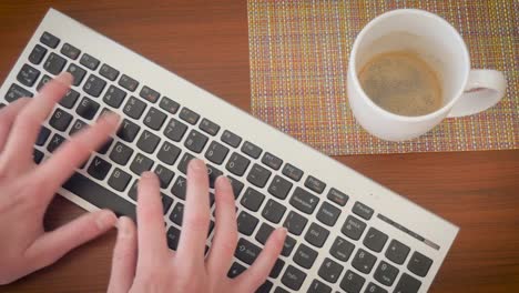 Woman-Blogger-Types-on-a-Computer-Keyboard