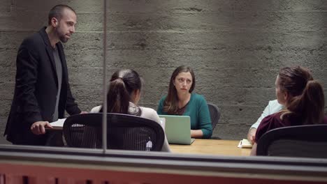 Angry-man-yelling-in-a-small-business-meeting