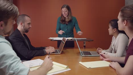 Angry-business-woman-throws-papers-into-the-air,-slow-motion