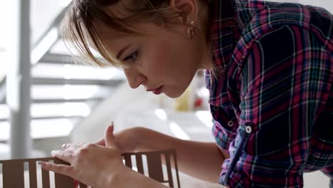 Woman-Working-As-Architect-Building-Housing-Project-Model