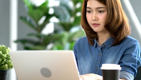 beautiful-asian-smart-woman-work-with-energy-and-happiness-joyful-in-modern-office-background