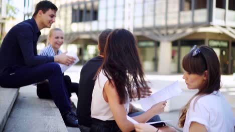 Young-hipster-business-group-working-together-&-brainstorming-for-ideas-near-business-office.-Portrait-of-young-diverse-business-team.-Large-business-organization