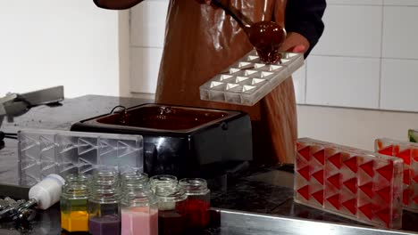 Professional-chocolatier-working-at-the-kitchen