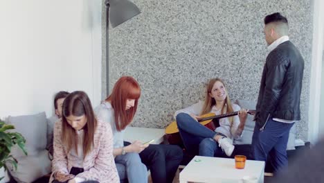 Colleagues-in-the-startup-office-relaxing-during-a-coffee-break