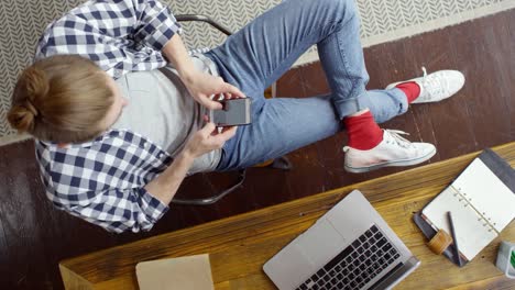 Top-View-of-Man-Taking-Break-from-Work