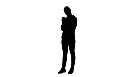 Silhouette-Tired-working-young-woman-reading-messages-on-the-phone