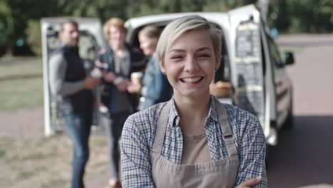 Portrait-of-Laughing-Owner-of-Mobile-Coffee-Van