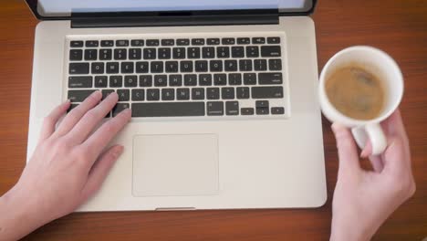 Female-Computer-Science-Major-Types-on-a-Laptop