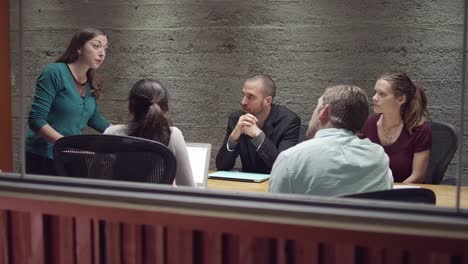 Angry-woman-yelling-in-a-small-business-meeting