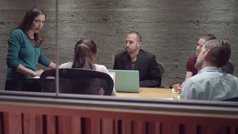 Angry-woman-yelling-in-a-small-business-meeting