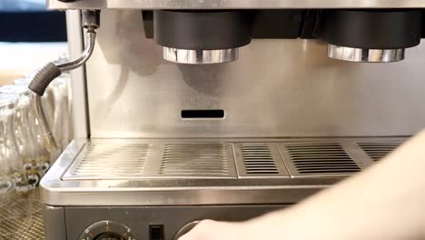 Preparing-cups-of-espresso-at-a-busy-coffee-shop