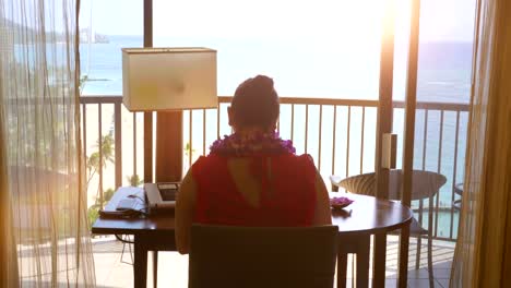 Woman-working-in-paradise-office-in-4k-slow-motion