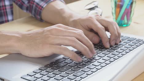 Black-Scott-Shirt-Businessman-Typing-Laptop-in-Home-Office-Close-Up-View