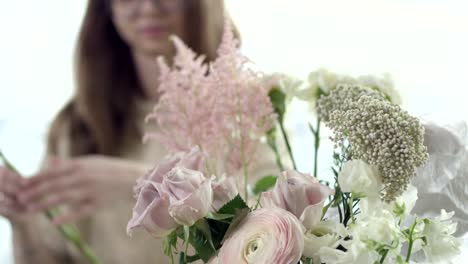 Young-Florist-Assembles-a-Bouquet