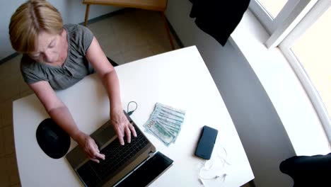 grandmother-working-on-laptop