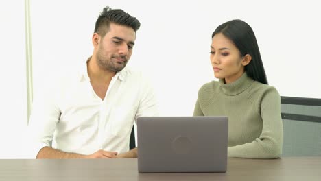 Portraits-of-Employee-talking-about-job-on-laptop-at-office.-Concept-business-sharing-ideas.