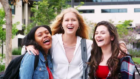 Portrait-Of-Female-High-School-Students-Outside-College-Buildings