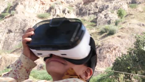 Little-Indian-kid-with-a-VR-virtual-reality-headset