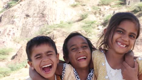 Portrait-of-Indian-kids-friends-siblings-hugging-smiling-playing-and-having-fun