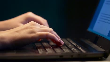 close-up-of-female-hands-with-laptop-typing