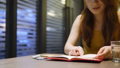 Young-Chinese-Student-with-books