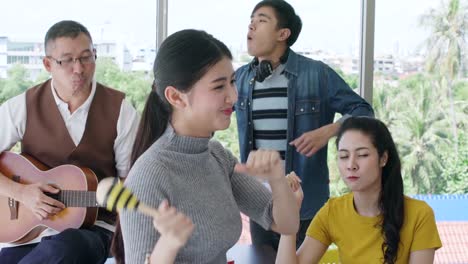 new-year-celebration-festive-party-friend-dance-and-sing-together-with-happiness-and-joyful-office-background