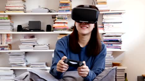 Woman-wearing-vr-in-her-room.-Girl-uses-a-virtual-reality-glasses-at-home.-People-with-technology-concept.