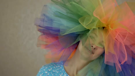 Indoors-portrait-of-amazing-caucasian-female-model-in-trendy-colorful-wig--woman-with-hair-having-fun-smiling-and-dancing-.